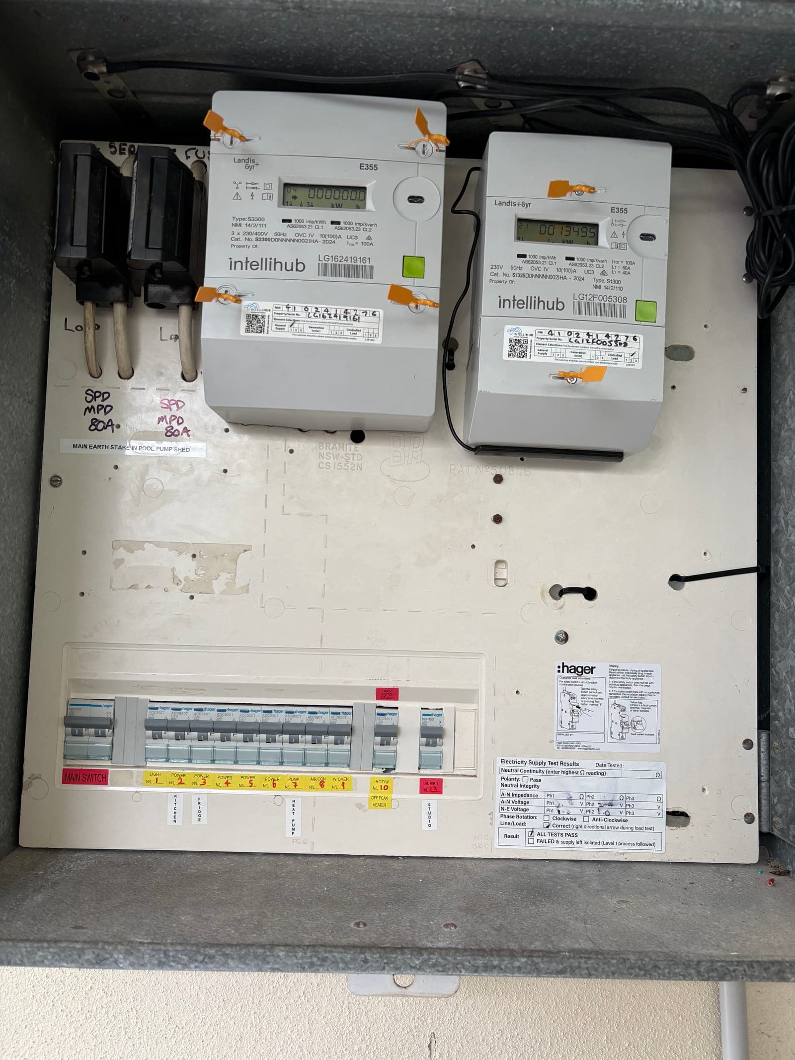 Clean new pool pump sub-board with Nuvolt Energy install branding